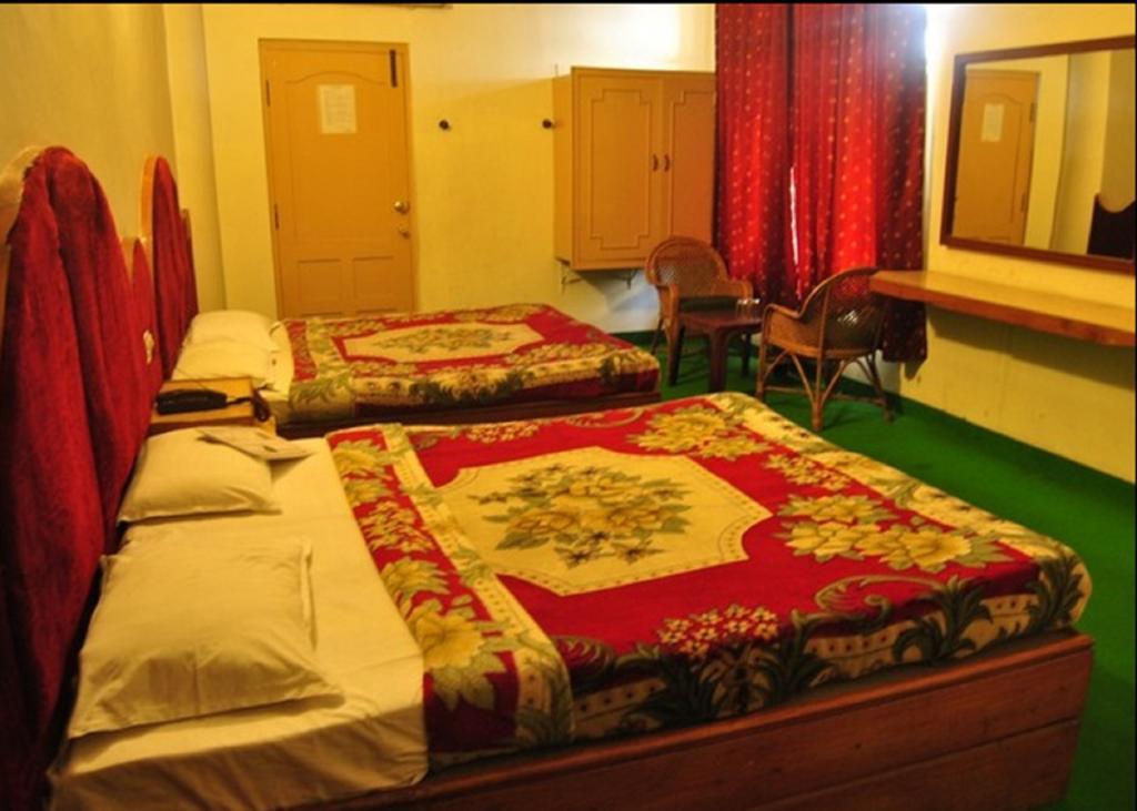 Hotel Ruby International Kodaikanal Ruang foto