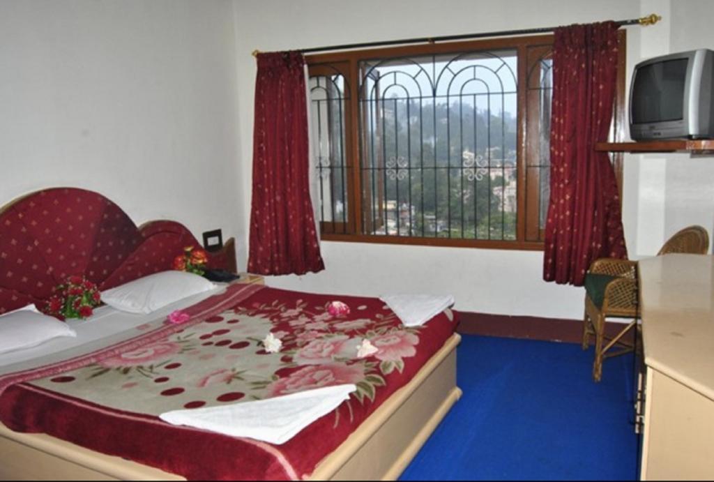 Hotel Ruby International Kodaikanal Ruang foto